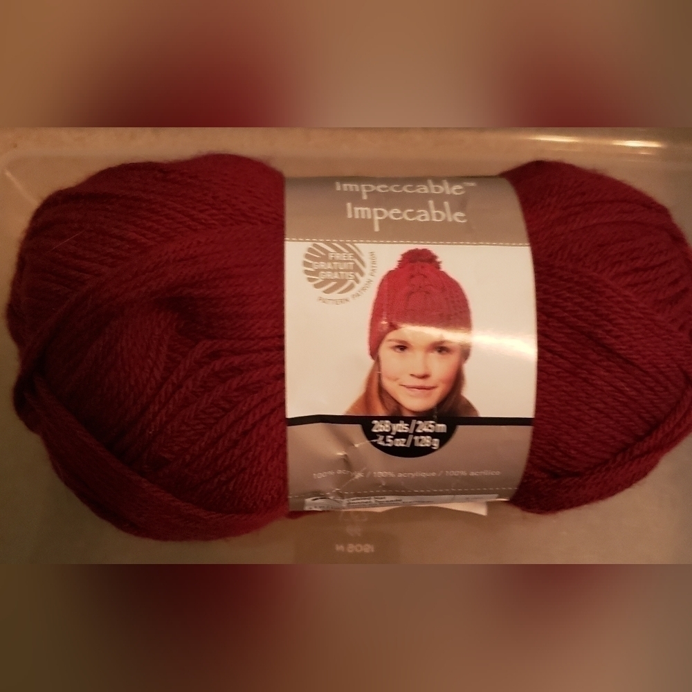 Impeccable Yarn, in Burgundy. I full Skein 268 Yards